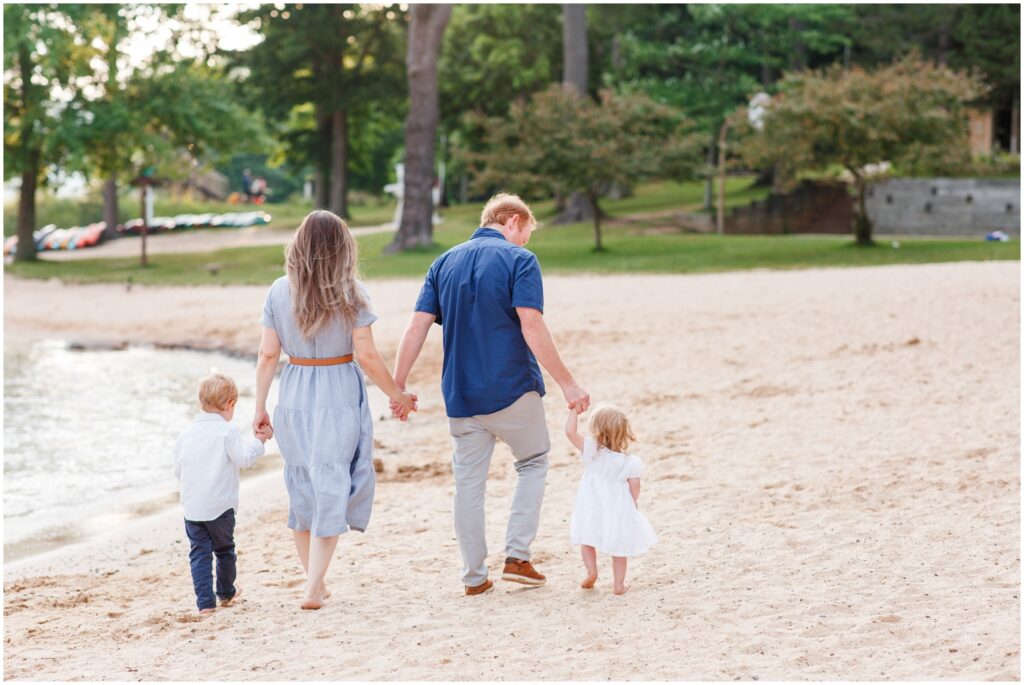 Family Walking On The Beach